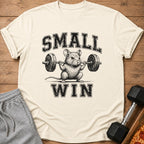 T-shirt with text "SMALL WIN" and drawing of a mouse lifting a barbell.