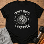 Black t-shirt with "I DON'T SWEAT I SPARKLE" and a disco ball design.