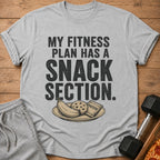 Grey t-shirt with "My Fitness Plan Has A Snack Section" text and snacks.