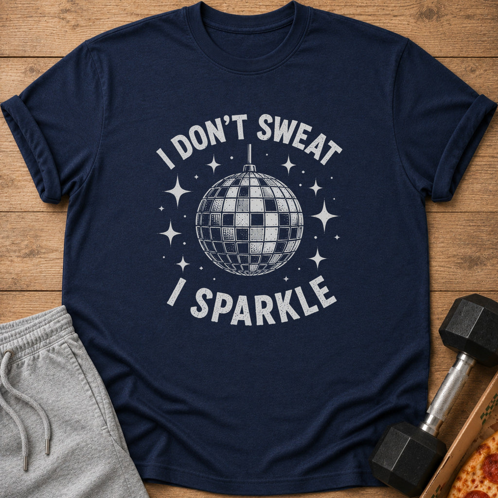 Navy t-shirt with disco ball graphic and text "I DON'T SWEAT I SPARKLE".