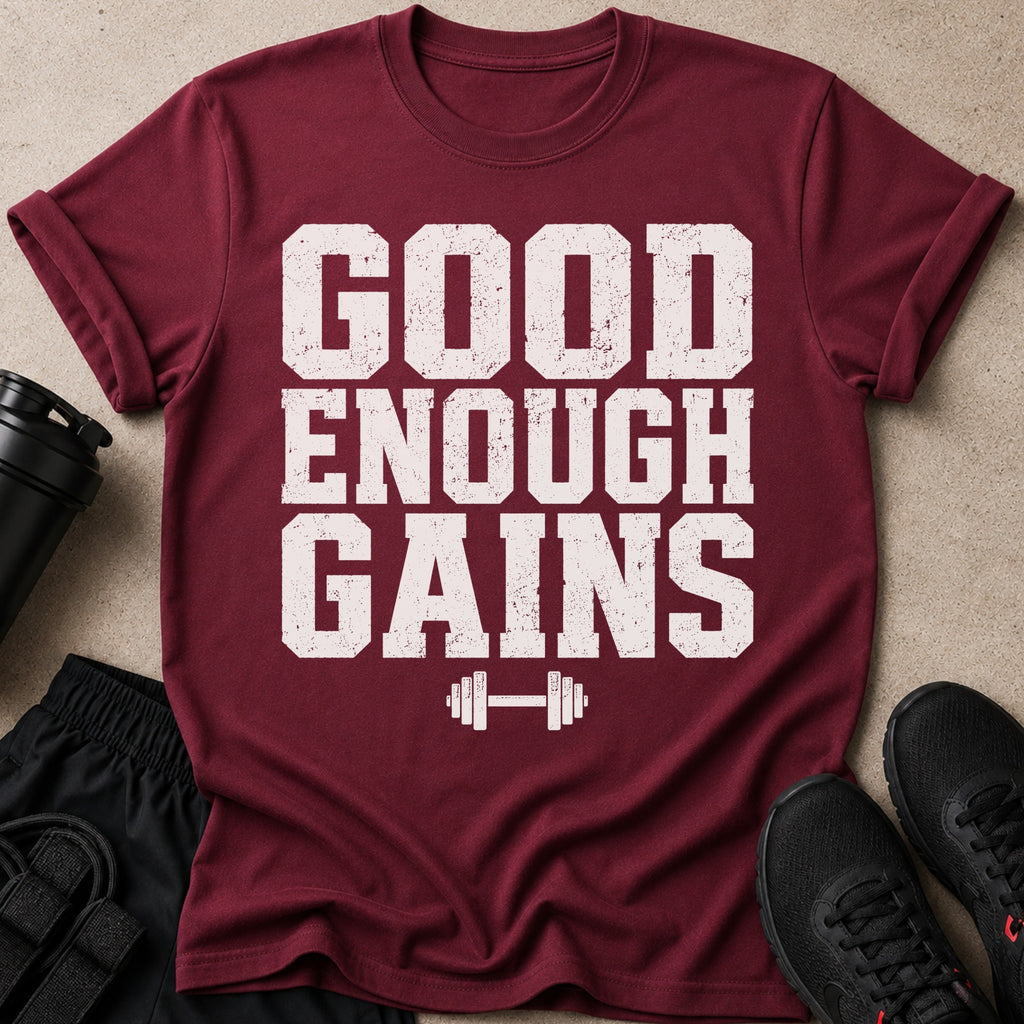 Maroon t-shirt with "GOOD ENOUGH GAINS" text and barbell graphic.