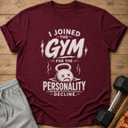 Maroon t-shirt with white text "I JOINED THE GYM FOR THE PERSONALITY DECLINE."