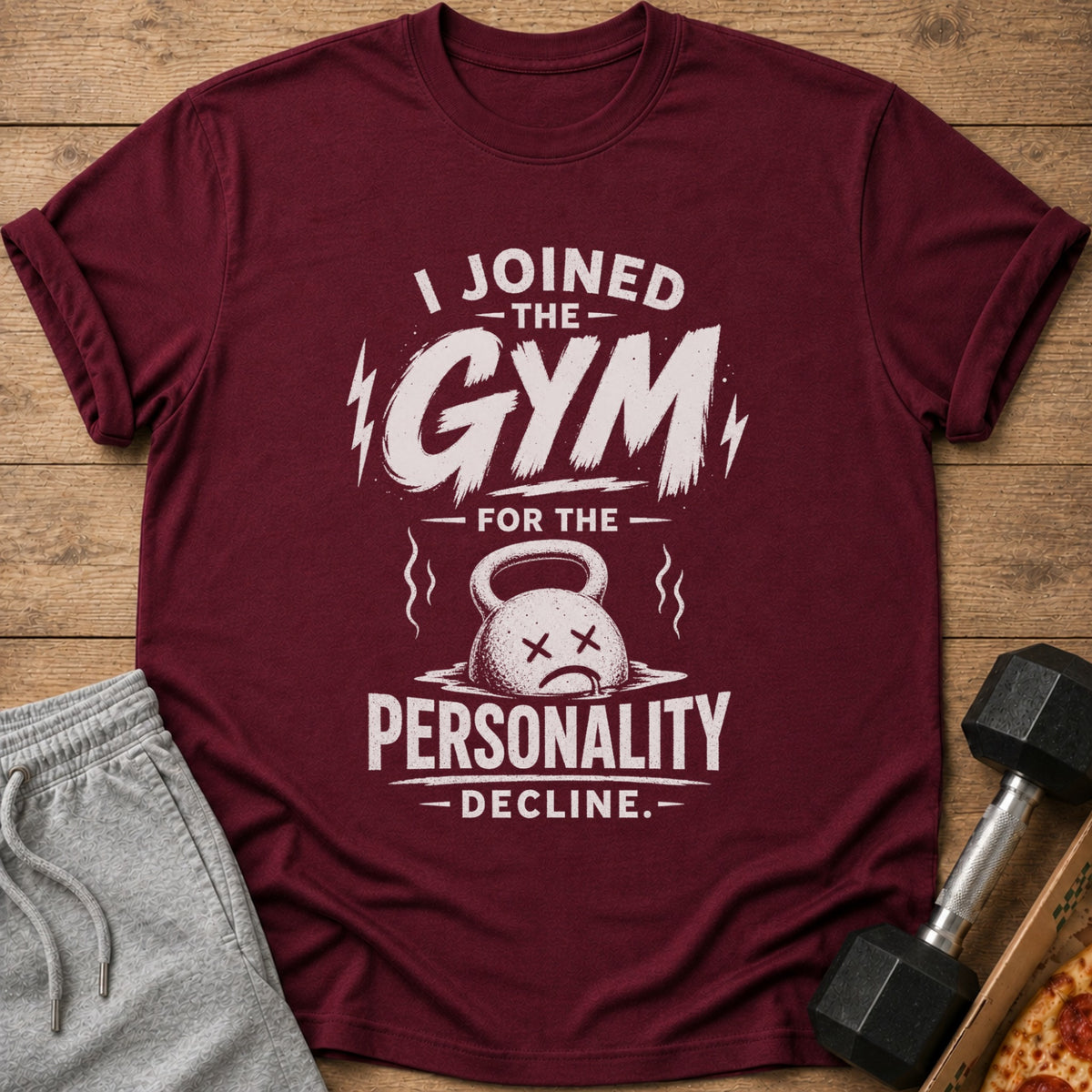 Maroon t-shirt with white text "I JOINED THE GYM FOR THE PERSONALITY DECLINE."