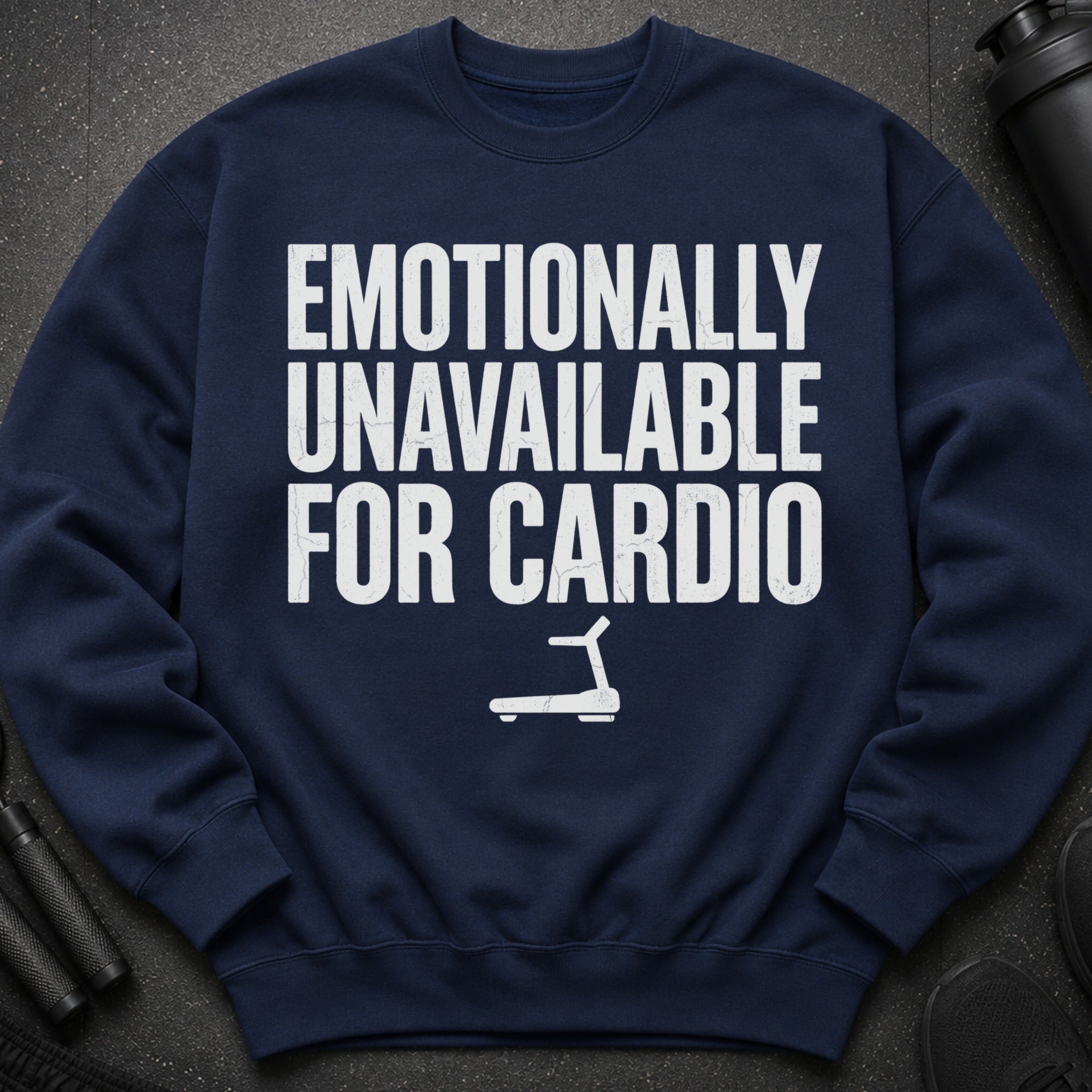 Navy sweatshirt with distressed white text "EMOTIONALLY UNAVAILABLE FOR CARDIO" and treadmill graphic.