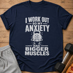 Navy t-shirt with "I work out so my anxiety has bigger muscles" text and cartoon.