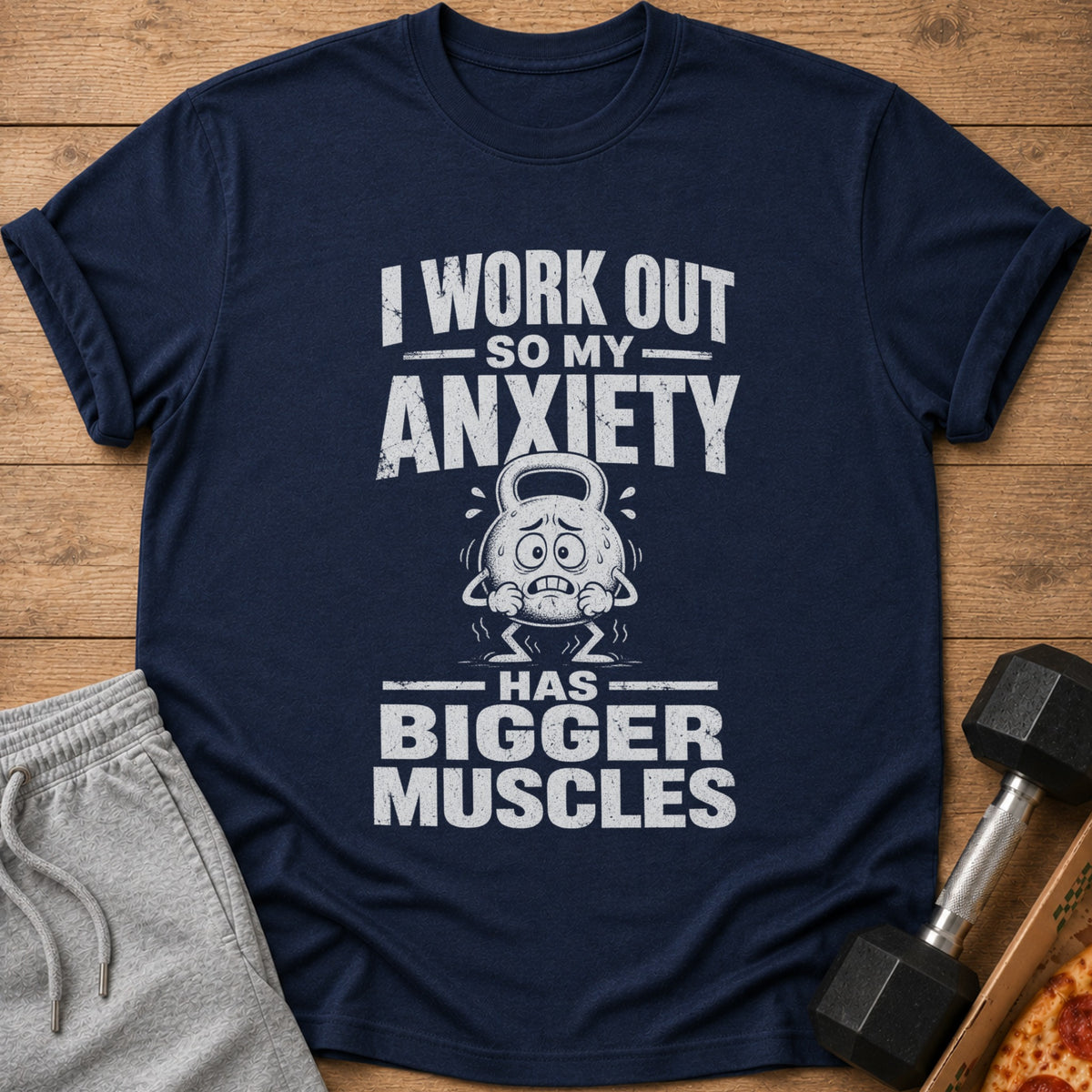 Navy t-shirt with "I work out so my anxiety has bigger muscles" text and cartoon.