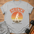 Grey t-shirt with "STRETCH" text, a stretching figure, and "Barely committed."