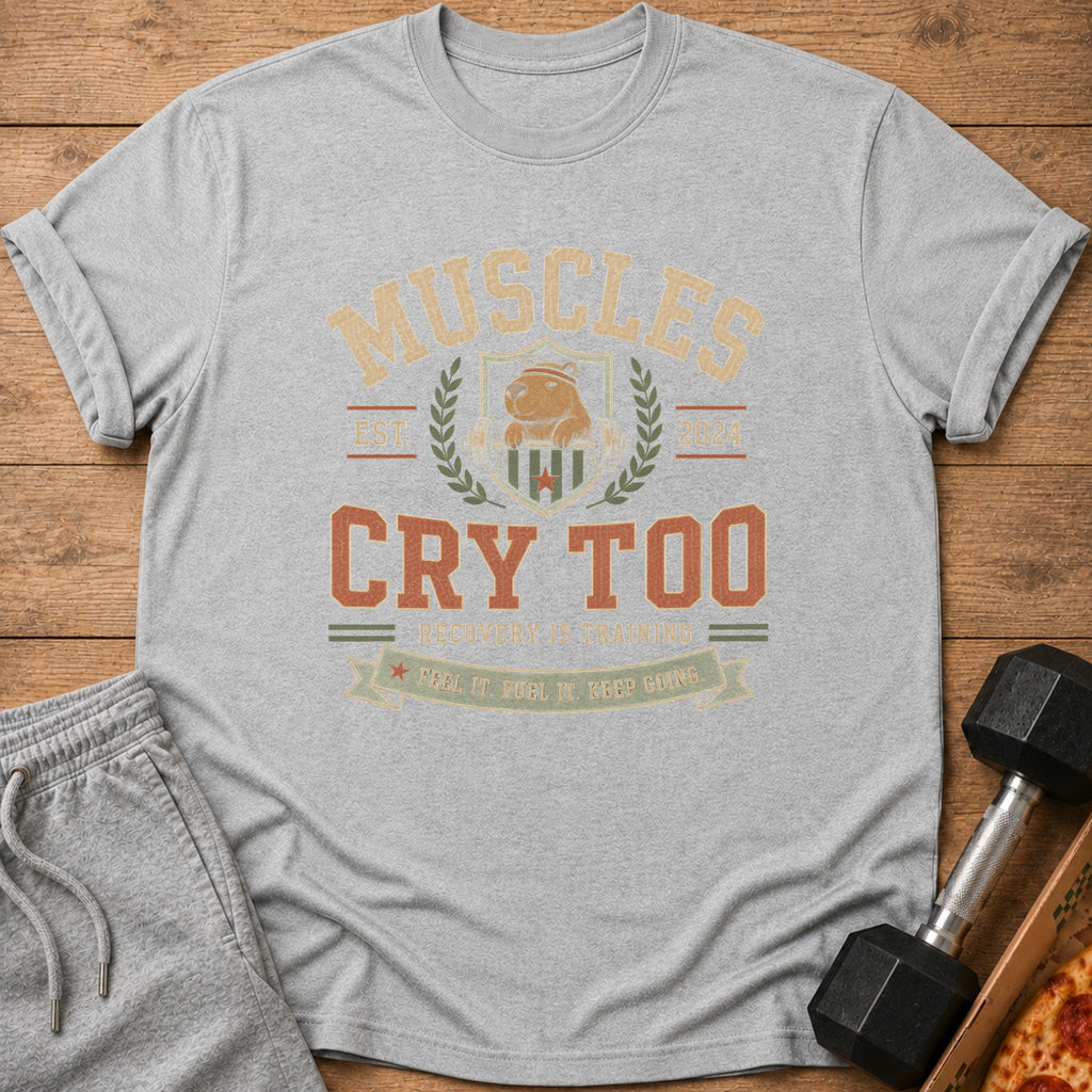 Grey t-shirt with "MUSCLES CRY TOO" text, capybara graphic, and gym/training slogans.