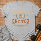 Grey t-shirt with "MUSCLES CRY TOO" text, capybara graphic, and gym/training slogans.