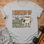 T-shirt with text "I showed up that was the hard part" and a coffee mug lifting a dumbbell.