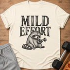 T-shirt with "Mild Effort" text and raccoon lifting dumbbell illustration.