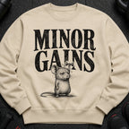 Crewneck sweatshirt with text "MINOR GAINS" and drawing of mouse lifting dumbbell.
