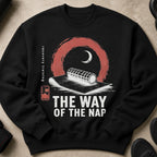 Black sweatshirt with graphic: "THE WAY OF THE NAP" and "recovery training" text, foam roller.