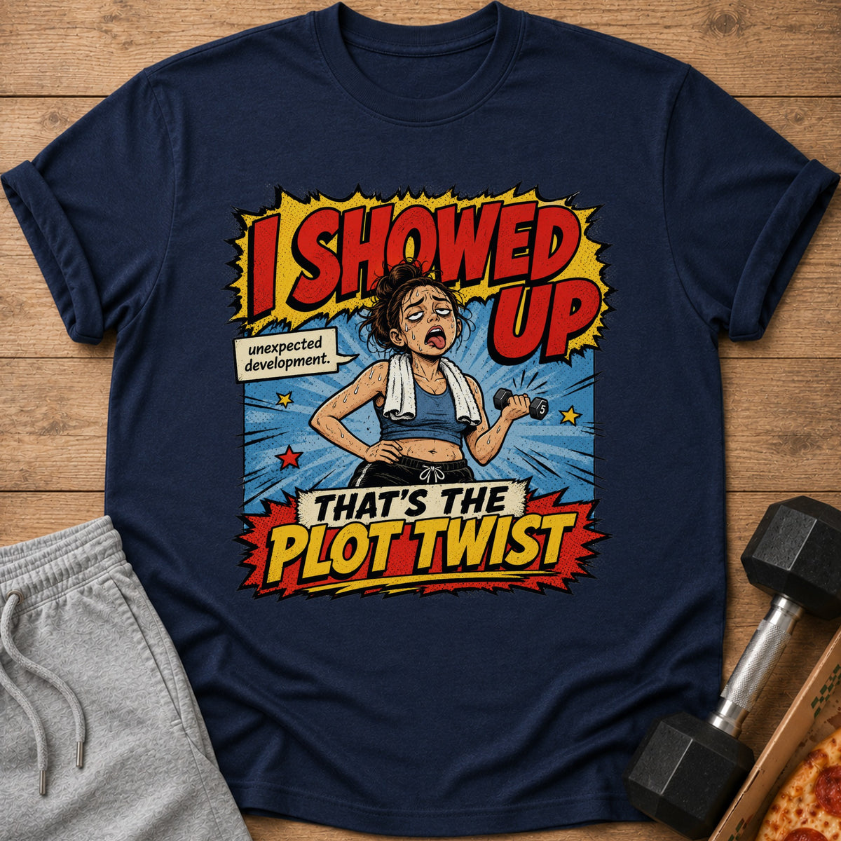 Navy t-shirt graphic of a woman lifting weights with text "I SHOWED UP" and "THAT'S THE PLOT TWIST".