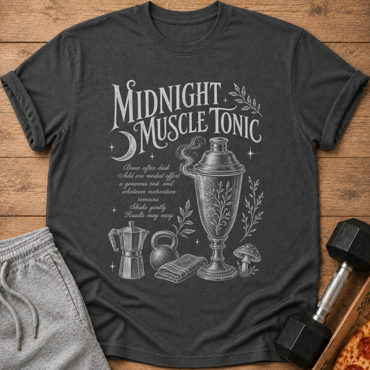 Dark t-shirt with "Midnight Muscle Tonic" text and potion-making ingredients illustration.