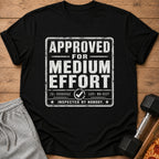 Black t-shirt with "APPROVED FOR MEDIUM EFFORT" text and "INSPECTED BY NOBODY."