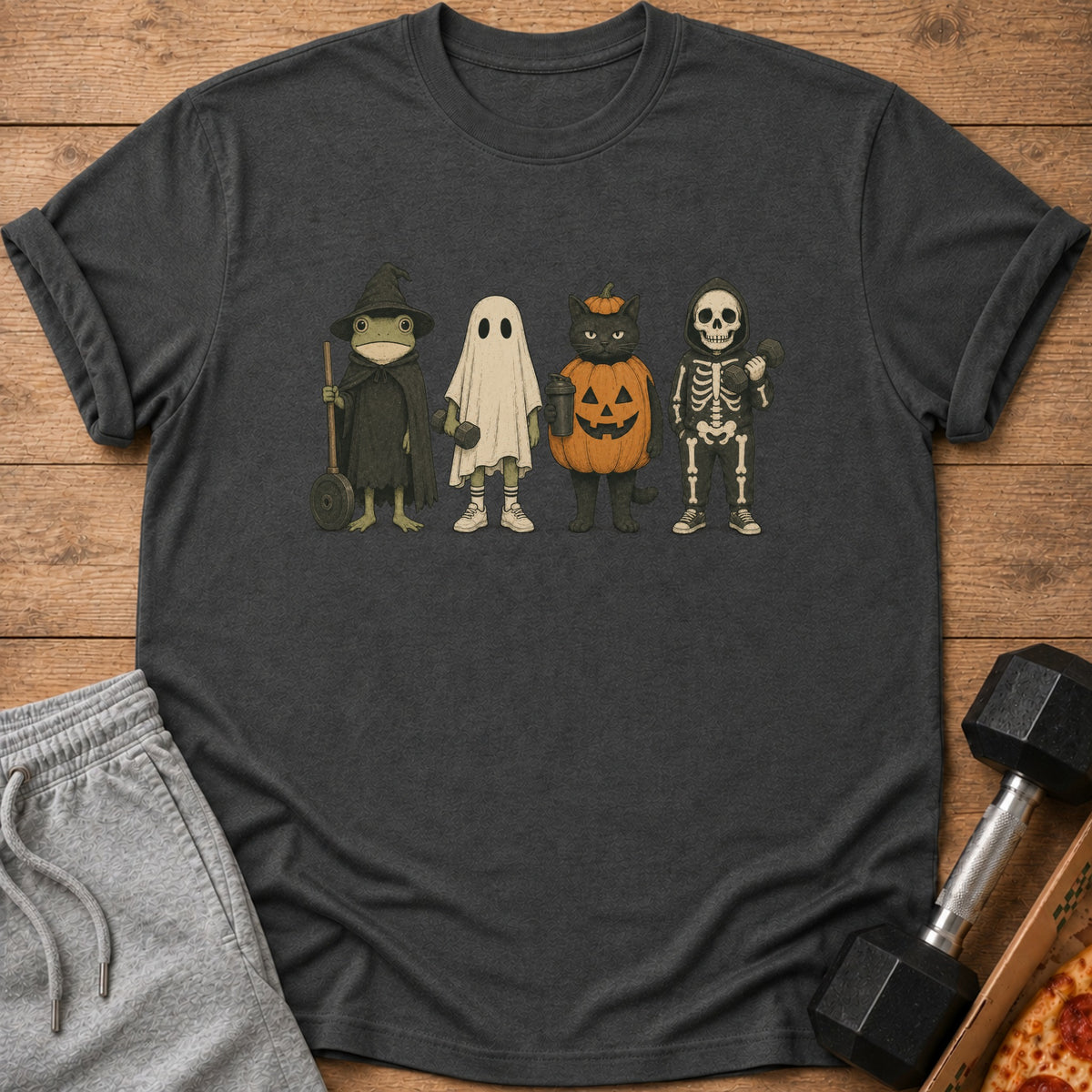 T-shirt with Halloween characters: frog, ghost, cat in pumpkin, skeleton.