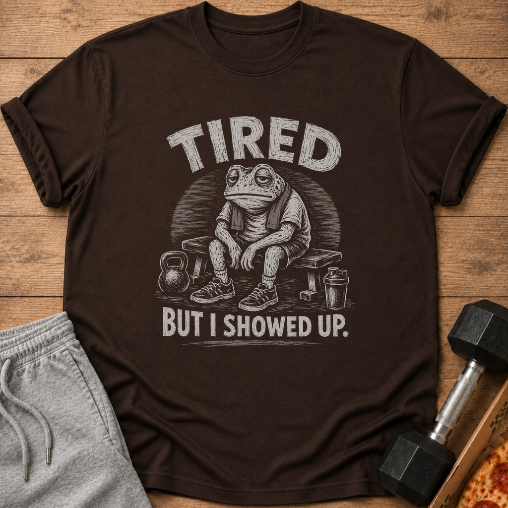 T-shirt with tired frog graphic and text "TIRED BUT I SHOWED UP."