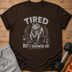 T-shirt with tired frog graphic and text "TIRED BUT I SHOWED UP."