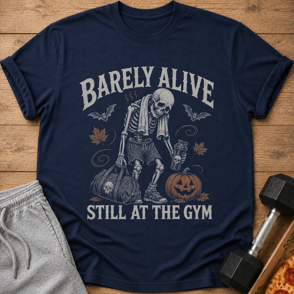Skeleton graphic with text "BARELY ALIVE STILL AT THE GYM" on a navy shirt.