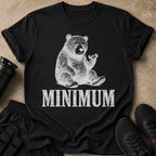 Black t-shirt with a distressed graphic of a tired bear lifting a dumbbell, text "MINIMUM".