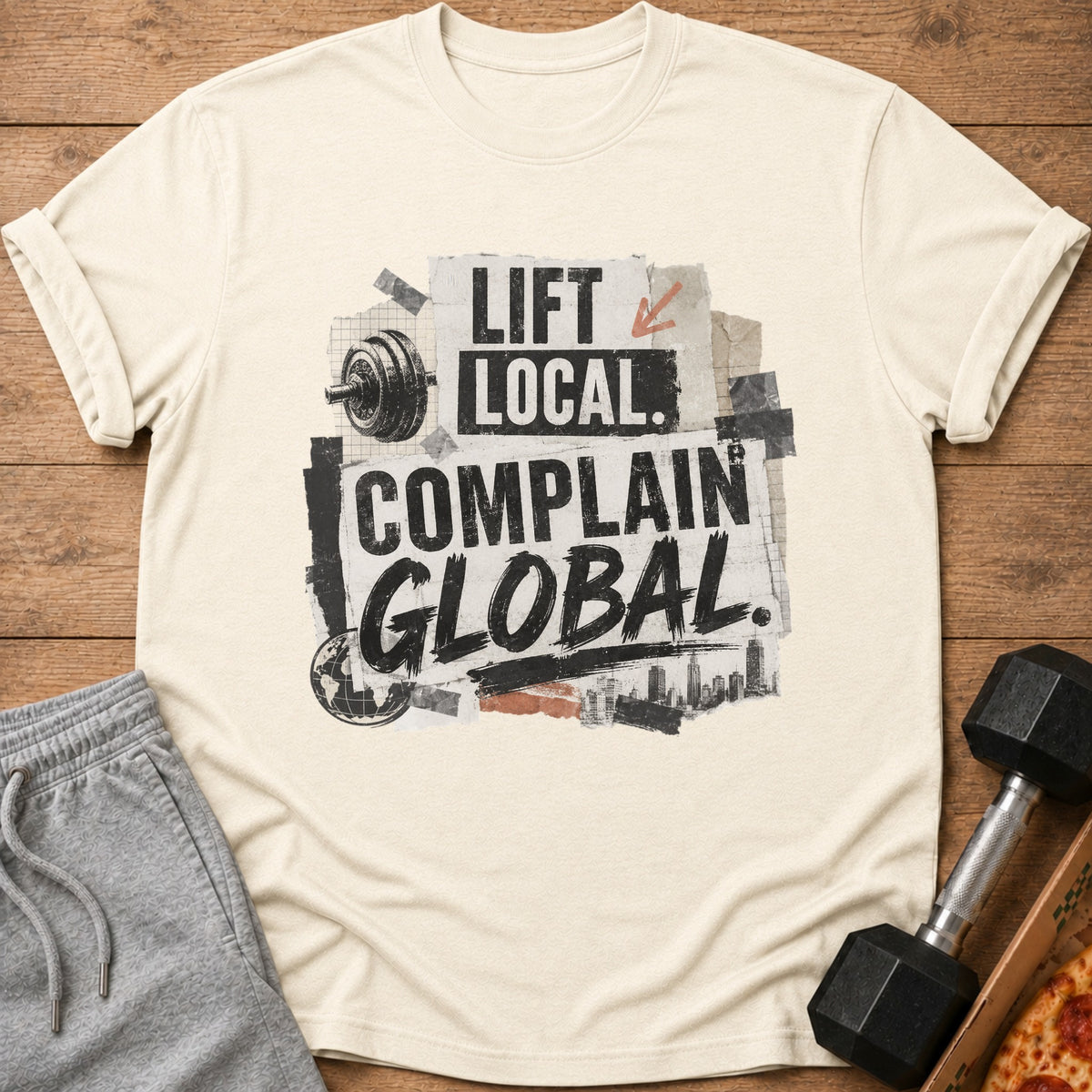 Cream t-shirt with "LIFT LOCAL. COMPLAIN GLOBAL." graphic and gym elements.