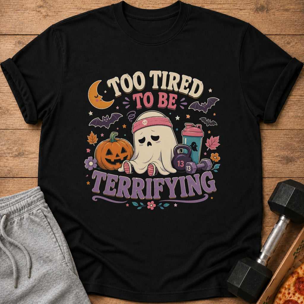 Black t-shirt with ghost, pumpkin, dumbbell, and "Too Tired To Be Terrifying" text.