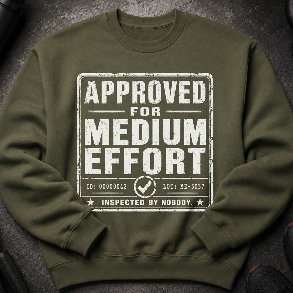 Olive green sweatshirt with "APPROVED FOR MEDIUM EFFORT INSPECTED BY NOBODY" graphic.