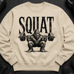 Lightweight sweatshirt with a Bigfoot character squatting with a barbell.