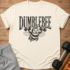 T-shirt with "DUMBLEBEE" text and a cartoon bee lifting dumbbells.