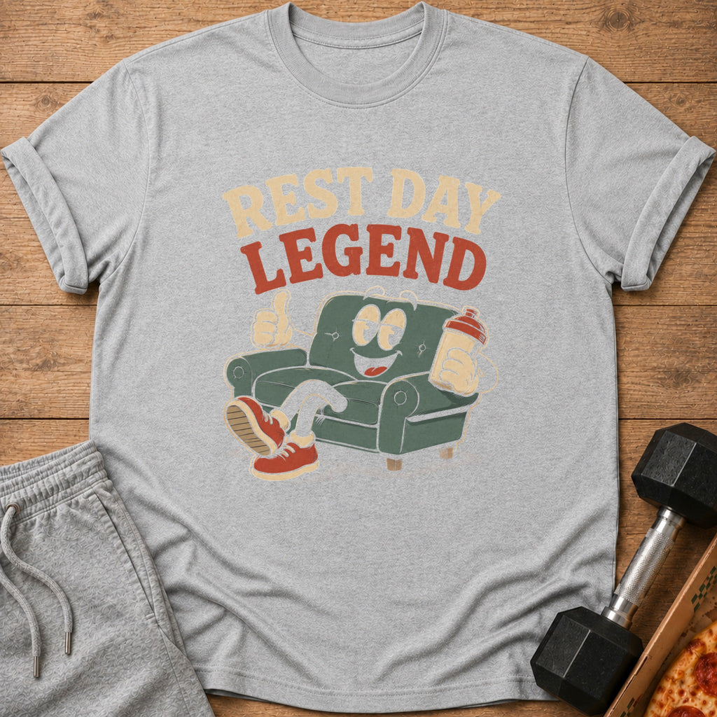 Grey t-shirt with "REST DAY LEGEND" text and cartoon couch character.