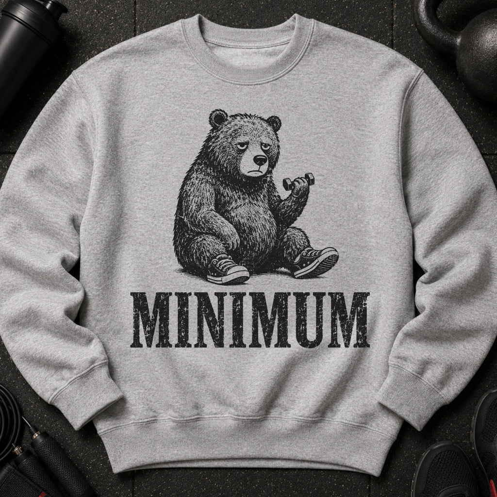 Grey sweatshirt with a graphic of a tired bear lifting a dumbbell and the word MINIMUM.