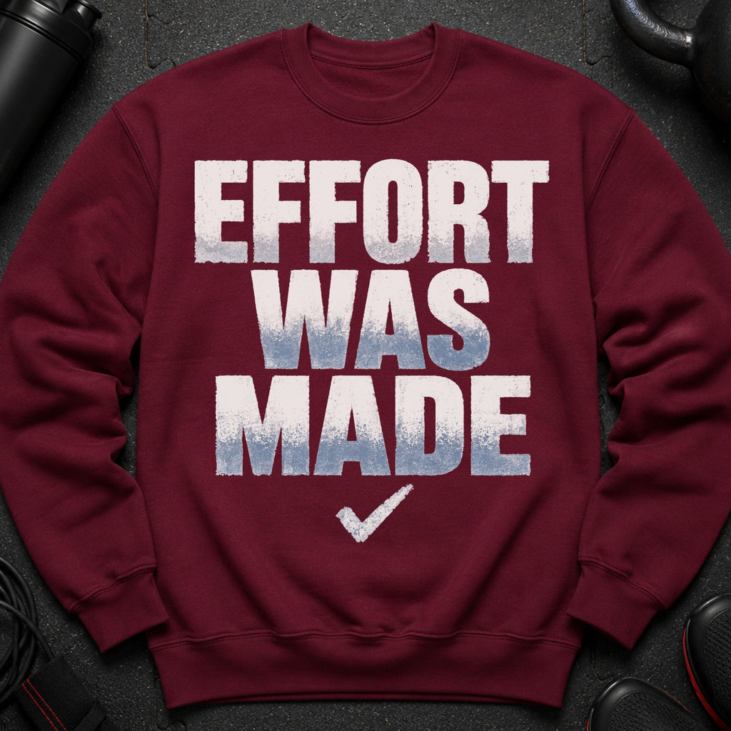 Maroon sweatshirt with white and blue text reading "EFFORT WAS MADE" and a checkmark.