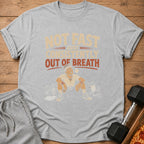 Gray t-shirt with "Not Fast Just Consistently Out of Breath" text and cartoon.