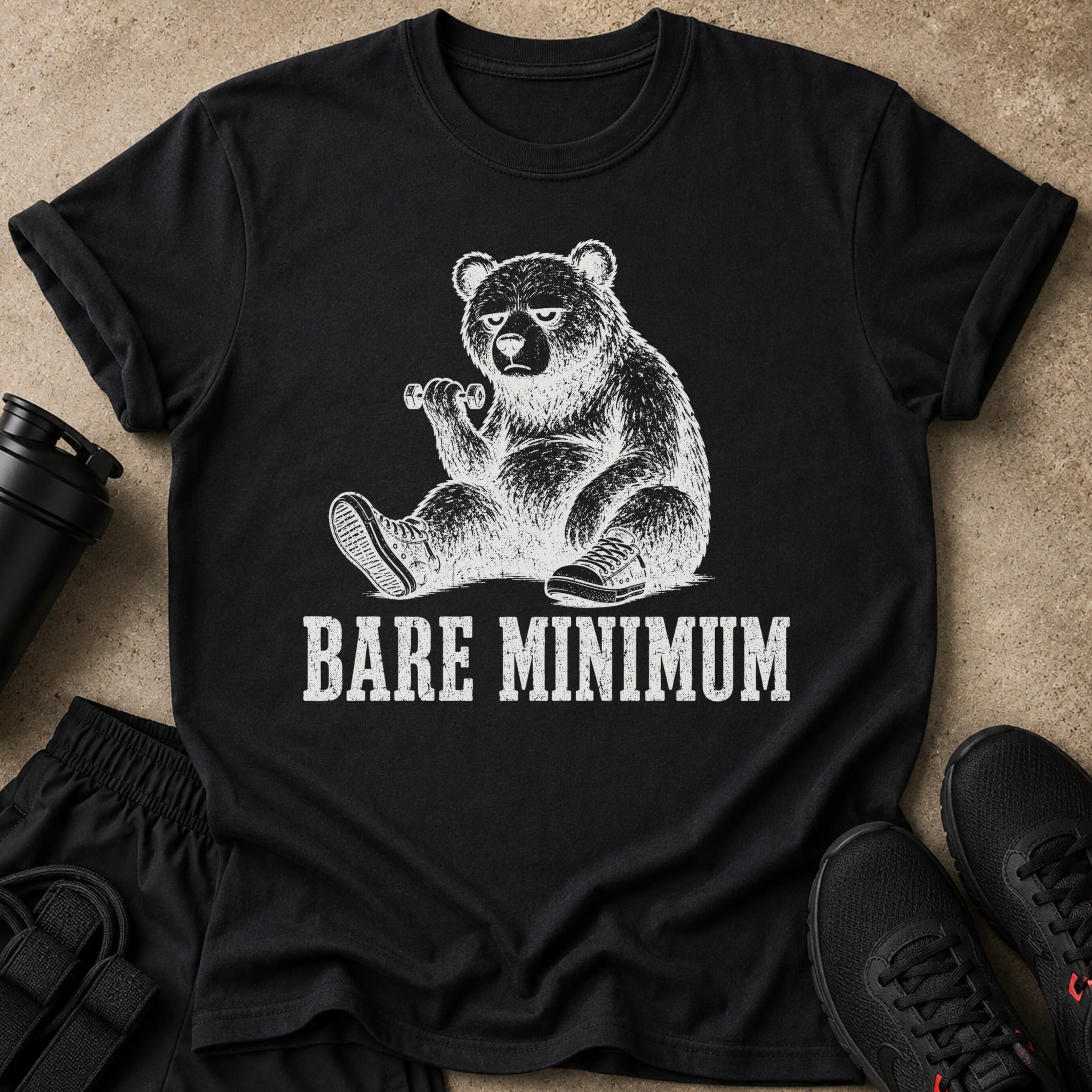 Black t-shirt with distressed graphic of a bear lifting a dumbbell, text BARE MINIMUM.