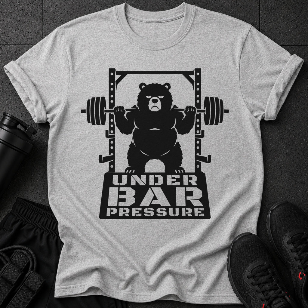 Black bear lifting weights on a squat rack with text "UNDER BAR PRESSURE".