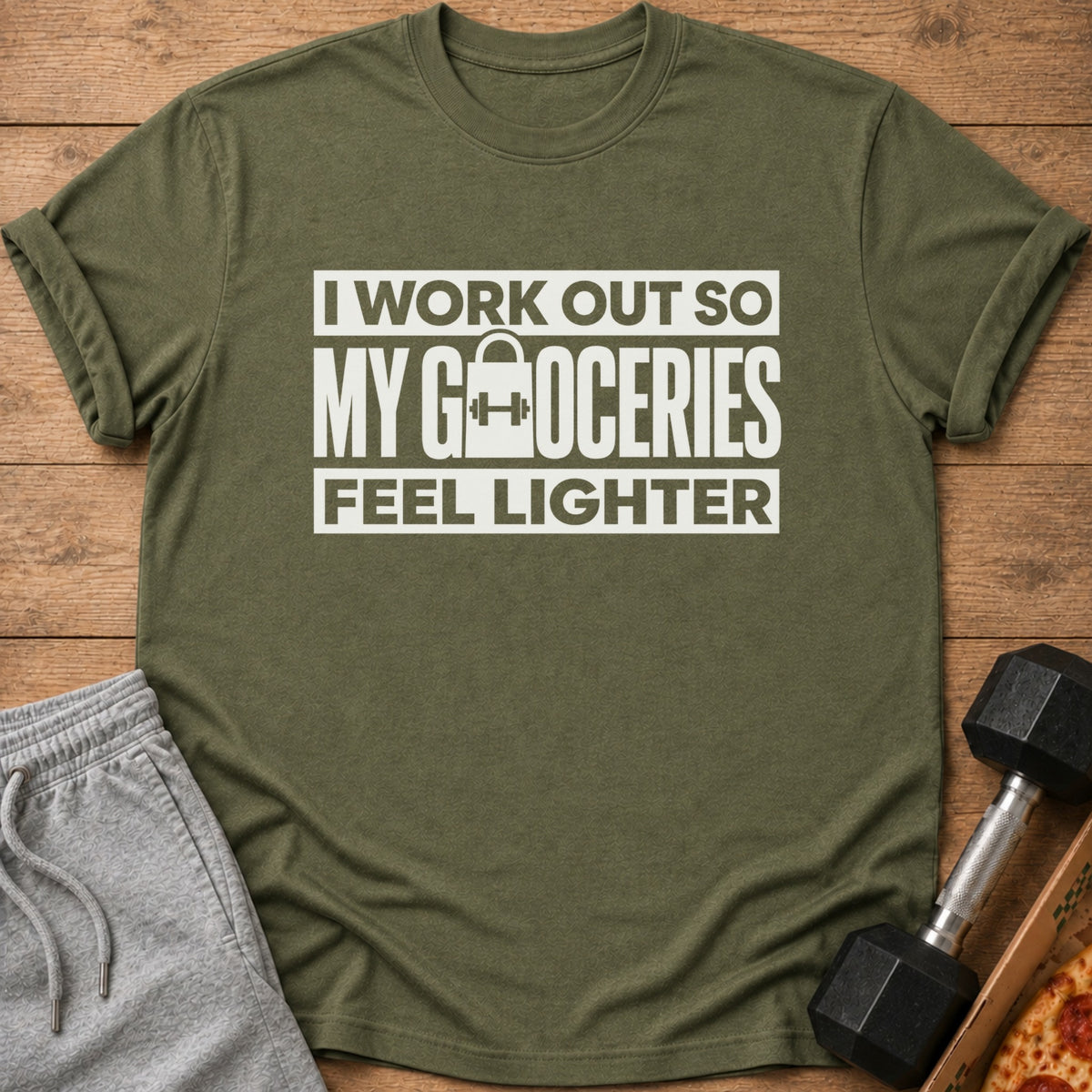 Olive t-shirt with white text "I WORK OUT SO MY GROCERIES FEEL LIGHTER."