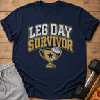 Navy t-shirt with text "LEG DAY SURVIVOR" and a trophy graphic.