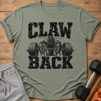 Muted green t-shirt with a distressed graphic of a lobster lifting a barbell, reading Claw Back.