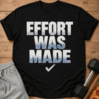 Black t-shirt with distressed text reading "EFFORT WAS MADE" and a checkmark.