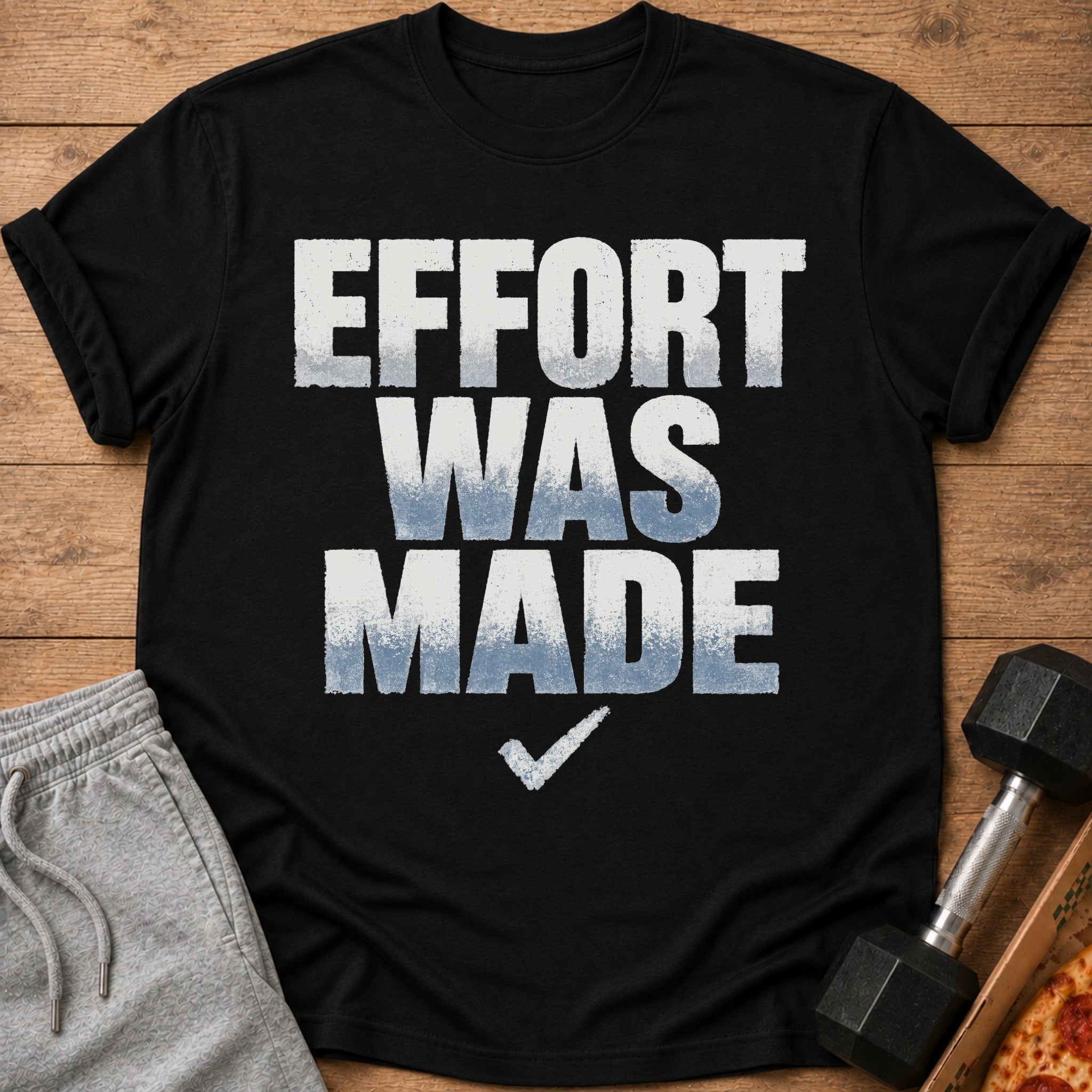 Black t-shirt with distressed text reading "EFFORT WAS MADE" and a checkmark.