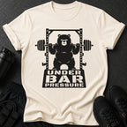 T-shirt features a black graphic of a bear lifting weights with text "UNDER BAR PRESSURE".