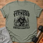 Green t-shirt with distressed graphic of a bear carrying groceries and text "FUNCTIONAL FITNESS UNFORTUNATELY".