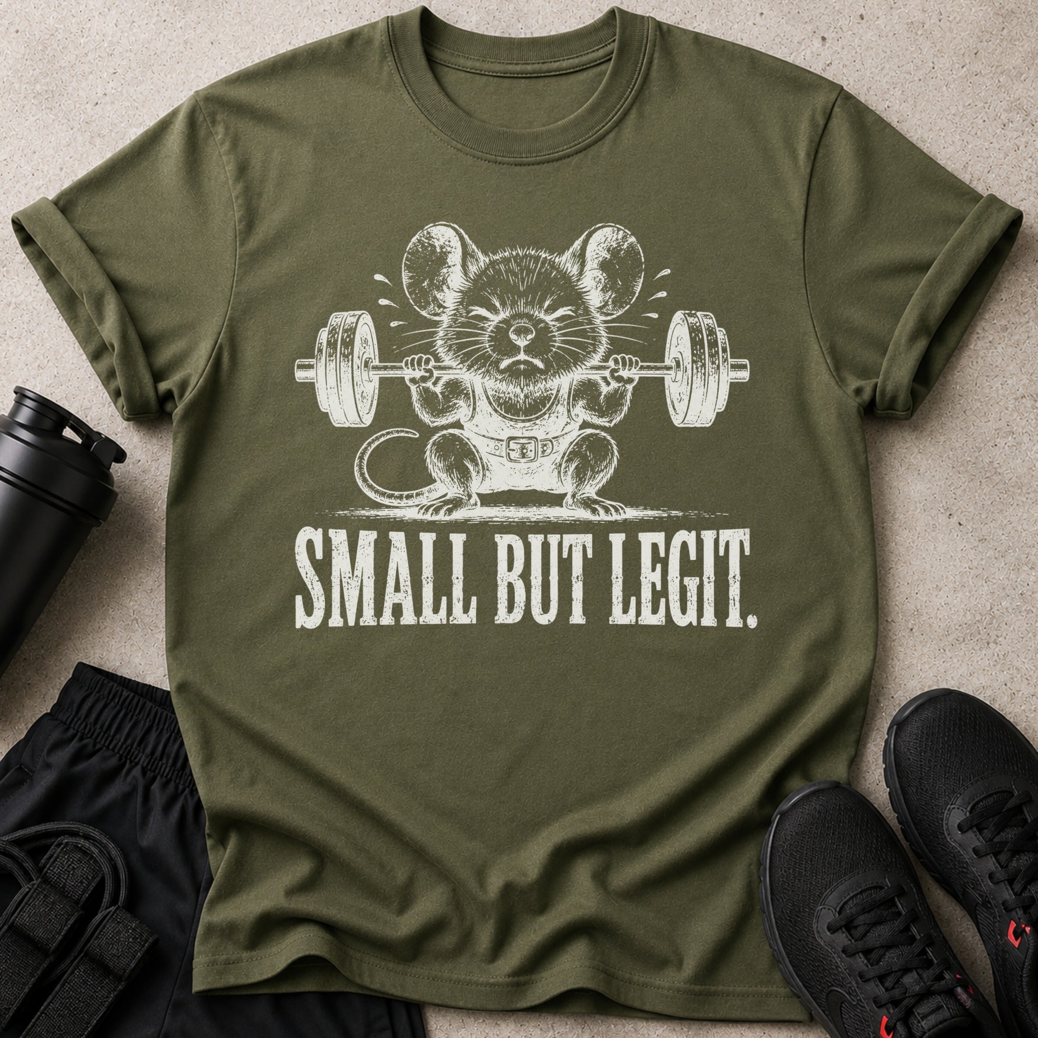 Olive t-shirt with a mouse lifting weights graphic and text "SMALL BUT LEGIT."