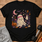 Tired ghost with headband sits near pumpkin, dumbbell, and kettlebell with moon and bats.