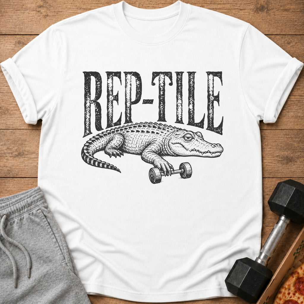 White t-shirt with black text "REP-TILE" and an alligator holding a dumbbell.