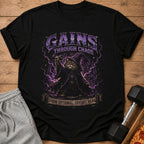 Black t-shirt with a wizard cat lifting a dumbbell, text "GAINS THROUGH CHAOS" and "FORM OPTIONAL. EFFORT REAL."