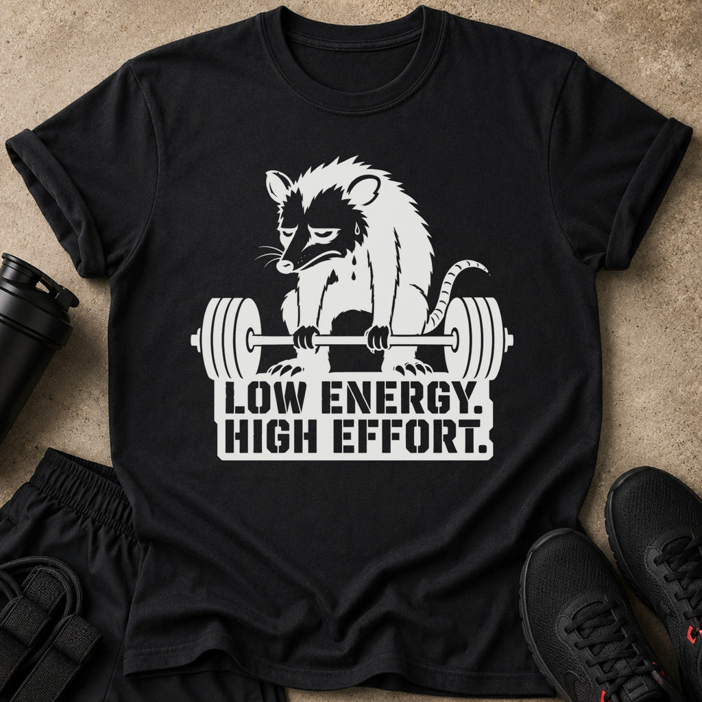 Black t-shirt with a possum lifting weights and text "LOW ENERGY. HIGH EFFORT."