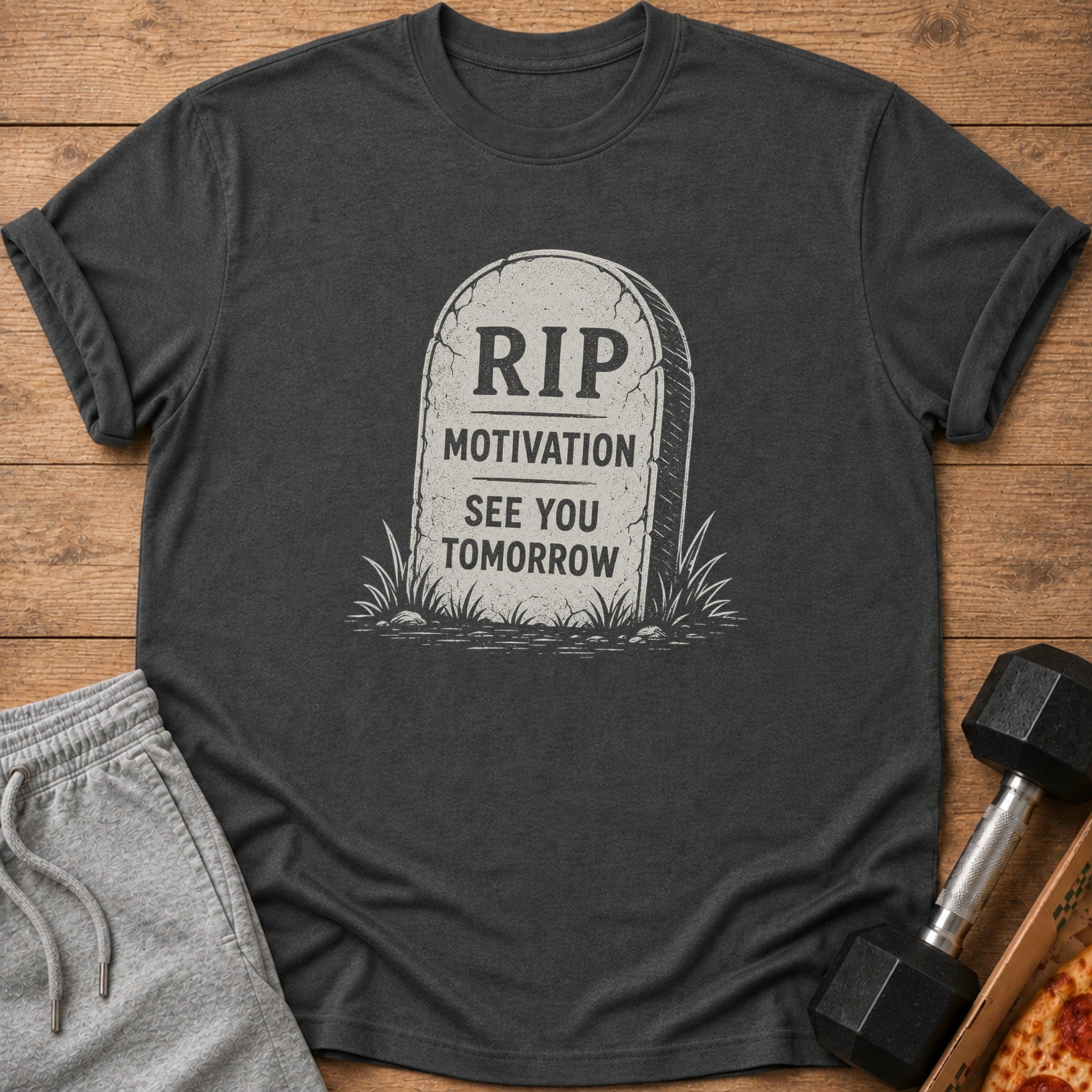 Dark grey t-shirt with tombstone graphic reading "RIP MOTIVATION SEE YOU TOMORROW."