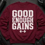 Maroon sweatshirt with white "GOOD ENOUGH GAINS" text and dumbbell graphic.